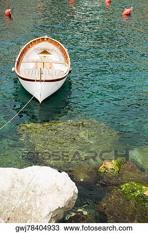 Boat moored in the sea, Cinque Terre National Park, RioMaggiore, Cinque Terre, La Spezia, Liguria, Italy View Large Photo Image Stock Image - Boat moored in the sea, Cinque Terre National Park, RioMaggiore, Cinque Terre, La Spezia, Liguria, Italy. Fotosearch