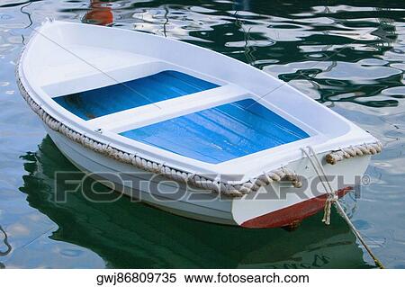 Stock Photography - Boat moored in the sea, Italian Riviera, Portofino, Genoa, Liguria, Italy. Fotosearch