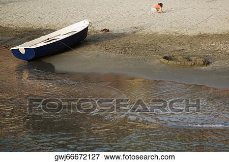 Boat on the beach, Italian Riviera, Cinque Terre National Park, Il Porticciolo, Vernazza, La Spezia, Liguria, Italy View Large Photo Image Stock Photo - Boat on the beach, Italian Riviera, Cinque Terre National Park, Il Porticciolo, Vernazza, La Spezia, Liguria, Italy. Fotosearch