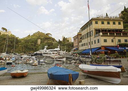 Boats at a harbor, Italian Riviera, Portofino, Genoa, Liguria, Italy View Large Photo Image Picture - Boats at a harbor, Italian Riviera, Portofino, Genoa, Liguria, Italy. Fotosearch