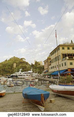 Boats at a harbor, Italian Riviera, Portofino, Genoa, Liguria, Italy View Large Photo Image Stock Photo - Boats at a harbor, Italian Riviera, Portofino, Genoa, Liguria, Italy. Fotosearch