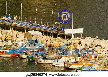 Picture - Boats at a harbor, Marina Grande, Capri, Sorrento, Sorrentine Peninsula, Naples Province, Campania, Italy. Fotosearch