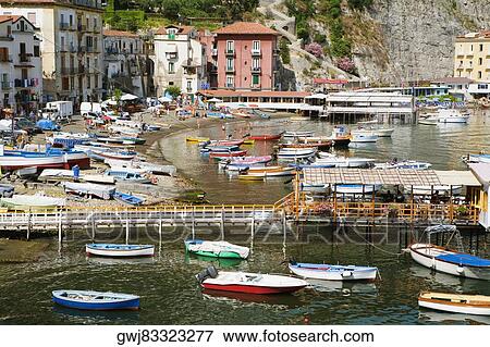 Boats at a harbor, Marina Grande, Capri, Sorrento, Sorrentine Peninsula, Naples Province, Campania, Italy View Large Photo Image Stock Photo - Boats at a harbor, Marina Grande, Capri, Sorrento, Sorrentine Peninsula, Naples Province, Campania, Italy. Fotosearch