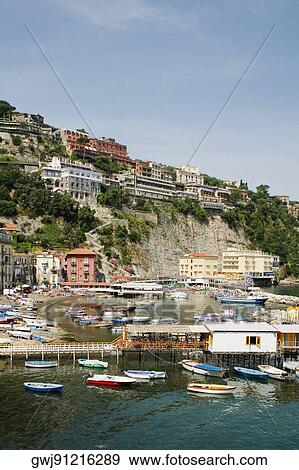 Boats at a harbor, Marina Grande, Capri, Sorrento, Sorrentine Peninsula, Naples Province, Campania, Italy View Large Photo Image Stock Photo - Boats at a harbor, Marina Grande, Capri, Sorrento, Sorrentine Peninsula, Naples Province, Campania, Italy. Fotosearch