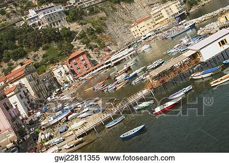 Boats at a harbor, Marina Grande, Capri, Sorrento, Sorrentine Peninsula, Naples Province, Campania, Italy View Large Photo Image Stock Photography - Boats at a harbor, Marina Grande, Capri, Sorrento, Sorrentine Peninsula, Naples Province, Campania, Italy. Fotosearch