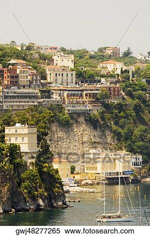 Boats at a harbor, Sorrento, Sorrentine Peninsula, Naples Province, Campania, Italy View Large Photo Image Stock Photography - Boats at a harbor, Sorrento, Sorrentine Peninsula, Naples Province, Campania, Italy. Fotosearch