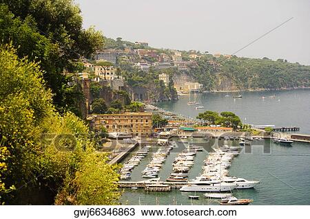 Boats docked at a harbor, Marina Grande, Capri, Sorrento, Sorrentine Peninsula, Naples Province, Campania, Italy View Large Photo Image Stock Image - Boats docked at a harbor, Marina Grande, Capri, Sorrento, Sorrentine Peninsula, Naples Province, Campania, Italy. Fotosearch