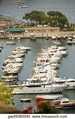 Boats docked at a harbor, Sorrento, Sorrentine Peninsula, Naples Province, Campania, Italy View Large Photo Image Stock Photography - Boats docked at a harbor, Sorrento, Sorrentine Peninsula, Naples Province, Campania, Italy. Fotosearch