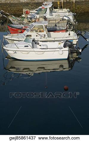 Boats docked at a port, Port Des Pecheurs, Biarritz, France View Large Photo Image Stock Photo - Boats docked at a port, Port Des Pecheurs, Biarritz, France. Fotosearch