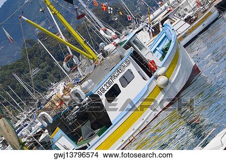 Boats moored at a harbor, Italian Riviera, Santa Margherita Ligure, Genoa, Liguria, Italy View Large Photo Image Picture - Boats moored at a harbor, Italian Riviera, Santa Margherita Ligure, Genoa, Liguria, Italy. Fotosearch