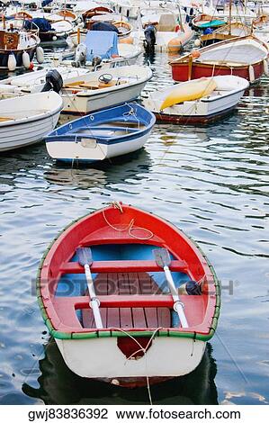 Boats moored at a harbor, Italian Riviera, Portofino, Genoa, Liguria, Italy View Large Photo Image Stock Image - Boats moored at a harbor, Italian Riviera, Portofino, Genoa, Liguria, Italy. Fotosearch
