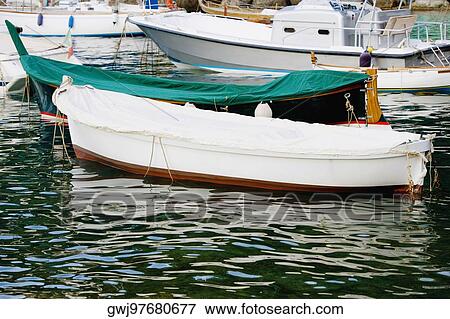 Boats moored at a harbor, Italian Riviera, Genoa, Liguria, Italy View Large Photo Image Stock Photo - Boats moored at a harbor, Italian Riviera, Genoa, Liguria, Italy. Fotosearch