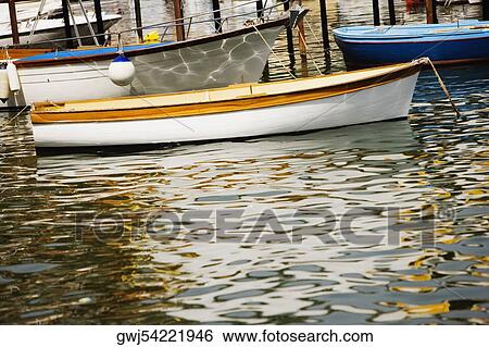 Boats moored at a harbor, Marina Grande, Capri, Sorrento, Sorrentine Peninsula, Naples Province, Campania, Italy View Large Photo Image Stock Photograph - Boats moored at a harbor, Marina Grande, Capri, Sorrento, Sorrentine Peninsula, Naples Province, Campania, Italy. Fotosearch