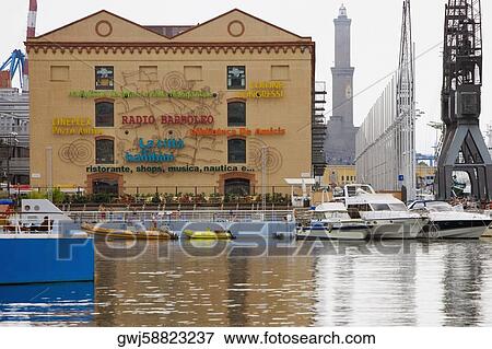 Boats moored at a harbor, Porto Antico, Genoa, Liguria, Italy View Large Photo Image Stock Photo - Boats moored at a harbor, Porto Antico, Genoa, Liguria, Italy. Fotosearch