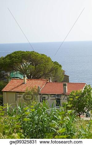 Building at the seaside, Italian Riviera, Mar Ligure, Genoa, Liguria, Italy View Large Photo Image Stock Image - Building at the seaside, Italian Riviera, Mar Ligure, Genoa, Liguria, Italy. Fotosearch