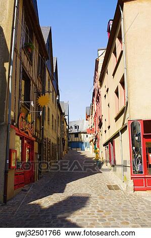 Buildings along an alley, Le Mans, Sarthe, Pays-de-la-Loire, France View Large Photo Image Stock Photograph - Buildings along an alley, Le Mans, Sarthe, Pays-de-la-Loire, France. Fotosearch