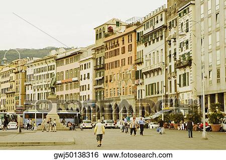 Buildings in a city, Piazza Caricamento, Palazzo San Giorgio, Genoa, Italy View Large Photo Image Stock Photograph - Buildings in a city, Piazza Caricamento, Palazzo San Giorgio, Genoa, Italy. Fotosearch