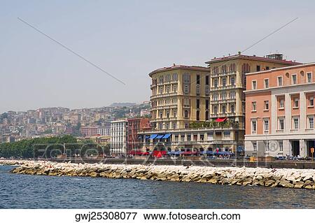 Buildings in a city, Via Partenope, Bay of Naples, Naples, Naples Province, Campania, Italy View Large Photo Image Stock Photo - Buildings in a city, Via Partenope, Bay of Naples, Naples, Naples Province, Campania, Italy. Fotosearch