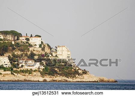 Buildings on a hill, Nice, Provence-Alpes-Cote D'Azur, France View Large Photo Image Stock Image - Buildings on a hill, Nice, Provence-Alpes-Cote D'Azur, France. Fotosearch