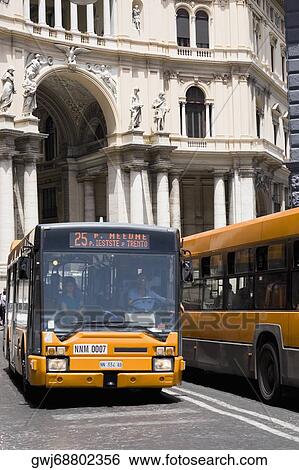 Bus in front of a building, Galleria Umberto I, Naples, Naples Province, Campania, Italy View Large Photo Image Stock Photograph - Bus in front of a building, Galleria Umberto I, Naples, Naples Province, Campania, Italy. Fotosearch