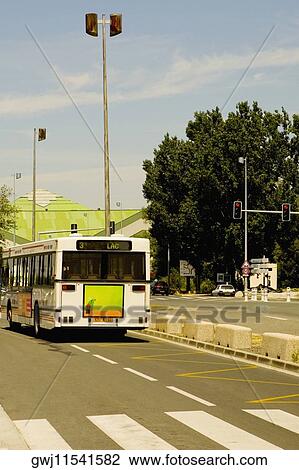 Stock Image - Bus on the road, Bordeaux, Aquitaine, France. Fotosearch