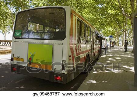 Bus parked at the roadside, Allees De Bristol, Bordeaux, Aquitaine, France View Large Photo Image Stock Photo - Bus parked at the roadside, Allees De Bristol, Bordeaux, Aquitaine, France. Fotosearch