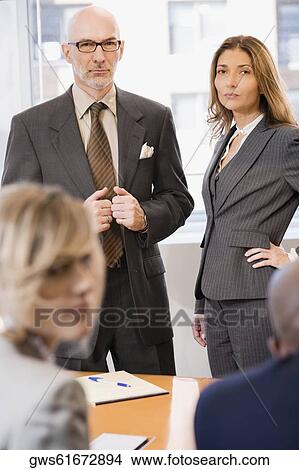 Business executives in a board room View Large Photo Image Picture - Business executives in a board room. Fotosearch