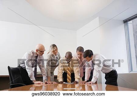 Business executives in a meeting View Large Photo Image Stock Image - Business executives in a meeting. Fotosearch