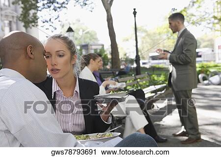 Businessman kissing a businesswoman View Large Photo Image Stock Image - Businessman kissing a businesswoman. Fotosearch