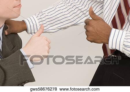 Businessmen making thumbs up View Large Photo Image Stock Photo - Businessmen making thumbs up. Fotosearch