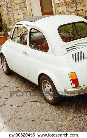 Stock Photograph - Car parked near a building, Sorrento, Sorrentine Peninsula, Naples Province, Campania, Italy. Fotosearch