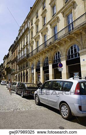 Cars along a road, Allees De Chartres, Bordeaux, Aquitaine, France View Large Photo Image Stock Photography - Cars along a road, Allees De Chartres, Bordeaux, Aquitaine, France. Fotosearch