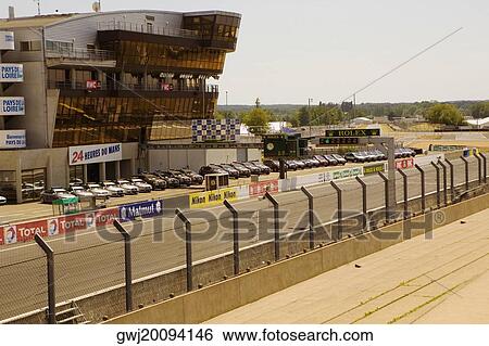 Cars in front of a stadium, Le Mans, France View Large Photo Image Stock Photograph - Cars in front of a stadium, Le Mans, France. Fotosearch