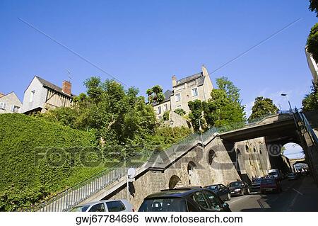 Stock Photograph - Cars moving under a footbridge, Le Mans, Sarthe, Pays-de-la-Loire, France. Fotosearch