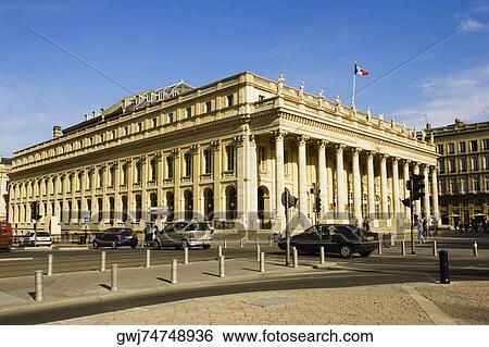 Stock Photograph - Cars on a road in front of a theatre, Grand Theater, Opera National De Bordeaux, Bordeaux, Aquitaine, France. Fotosearch