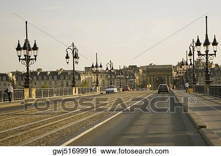 Cars on the road, Porte De Bourgogne, Pont De Pierre, Garonne River, Bordeaux, Aquitaine, France View Large Photo Image Stock Photograph - Cars on the road, Porte De Bourgogne, Pont De Pierre, Garonne River, Bordeaux, Aquitaine, France. Fotosearch