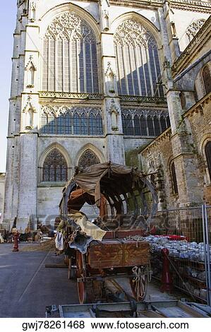 Stock Photo - Cart in front of a cathedral, Le Mans Cathedral, Le Mans, France. Fotosearch