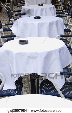 Chairs and tables at a restaurant, Italian Riviera, Portofino, Genoa, Liguria, Italy View Large Photo Image Stock Image - Chairs and tables at a restaurant, Italian Riviera, Portofino, Genoa, Liguria, Italy. Fotosearch