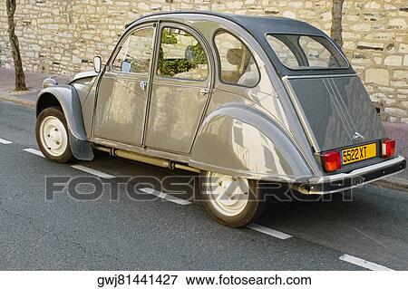 Citroen 2CV car on a road, Biarritz, France View Large Photo Image Stock Photo - Citroen 2CV car on a road, Biarritz, France. Fotosearch