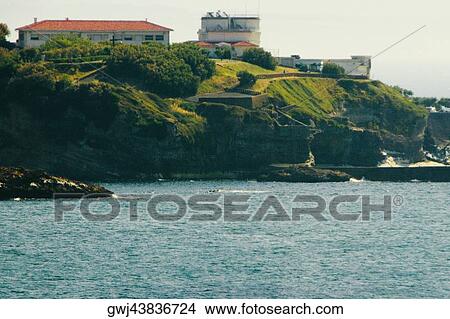 Cliff at a seaside, St. Martin, Biarritz, France View Large Photo Image Picture - Cliff at a seaside, St. Martin, Biarritz, France. Fotosearch