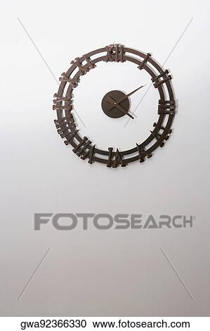 Stock Image - Clock on a wall. Fotosearch