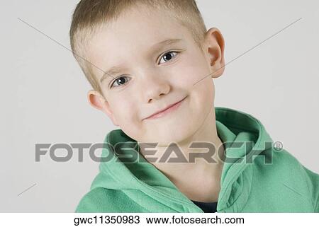 Stock Image - Close-up of a boy smiling. Fotosearch