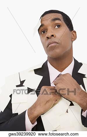 Close-up of a businessman covered with adhesive notes and thinking View Large Photo Image Stock Image - Close-up of a businessman covered with adhesive notes and thinking. Fotosearch