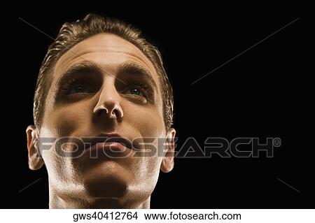 Close-up of a businessman thinking View Large Photo Image Picture - Close-up of a businessman thinking. Fotosearch