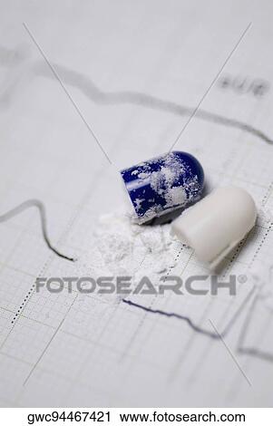 Close-up of a capsule on a medical report View Large Photo Image Stock Image - Close-up of a capsule on a medical report. Fotosearch