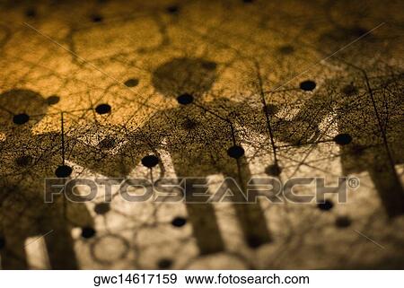 Close-up of a circuit board with paper chain dolls shadow on it View Large Photo Image Stock Photo - Close-up of a circuit board with paper chain dolls shadow on it. Fotosearch