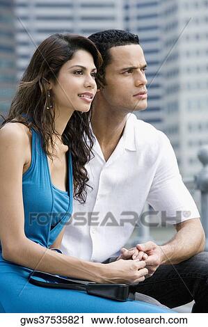 Close-up of a couple holding each other's hands View Large Photo Image Stock Image - Close-up of a couple holding each other's hands. Fotosearch