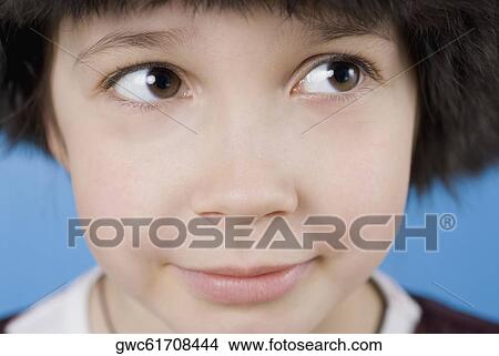 Close-up of a girl looking sideways View Large Photo Image Picture - Close-up of a girl looking sideways. Fotosearch