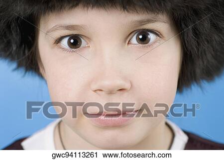 Close-up of a girl staring View Large Photo Image Stock Image - Close-up of a girl staring. Fotosearch