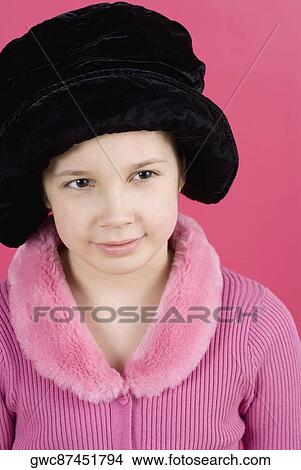 Picture - Close-up of a girl wearing a fur hat. Fotosearch